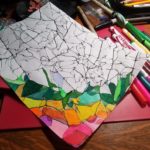 I used markers, colored pencils, and gel pens to fill in the spaces.